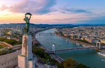Budapest cityscapes form Gellert Hill. Amazing sunset in the background. Included the Danube river, historical bridges, Budapest dwontown, Gellrt square, Gellert hotel, Gellert thermal bath,Gellert Square and Liberty bridge