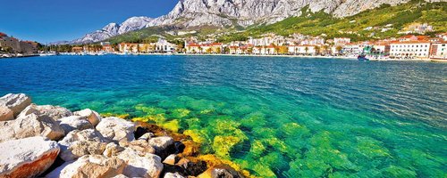 Makarska turquoise waterfront and Biokovo mountain view, Dalmatia region of Croatia