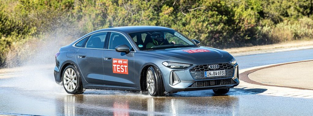 Fahrzeug auf nasser Fahrbahn auf Teststrecke in Mireval.